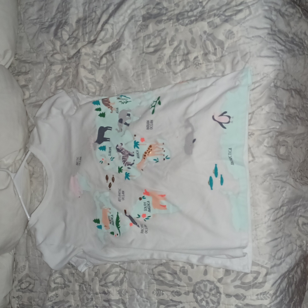 White shirt that had the world on it